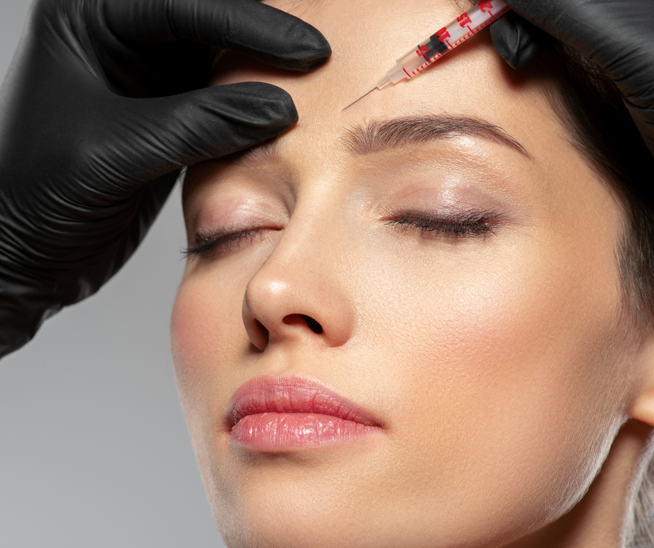 Image of a model receiving treatment near the brow area.