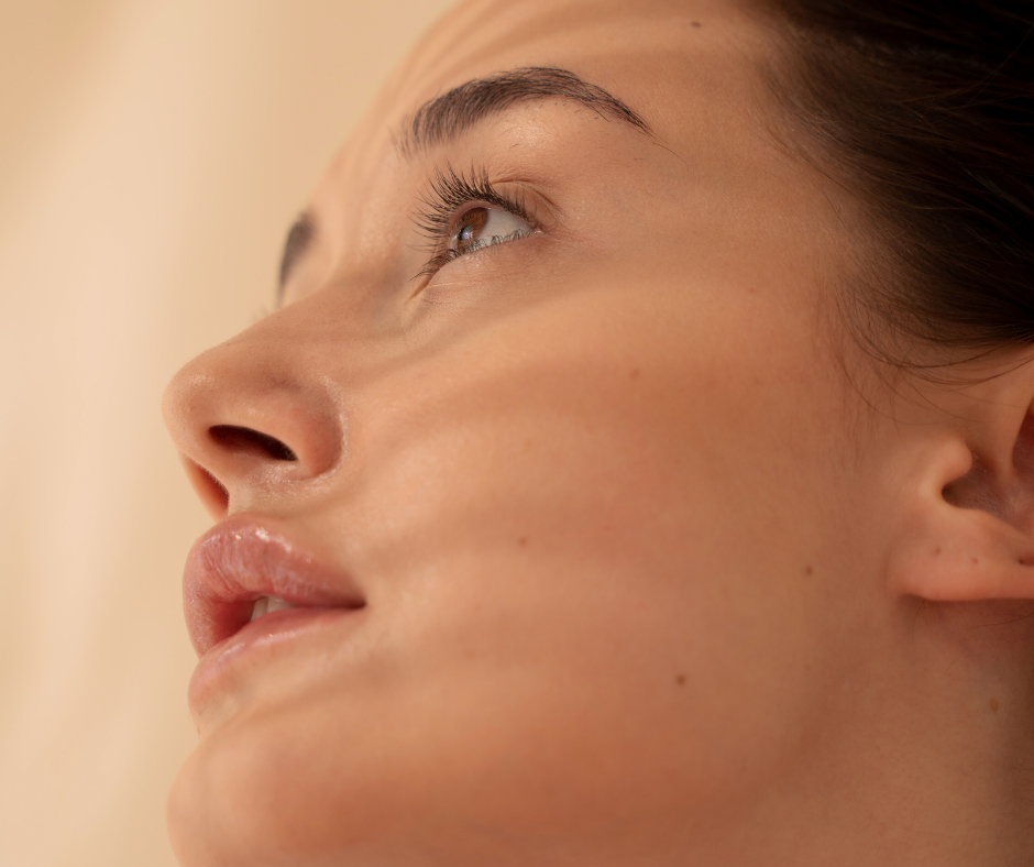 A Model looking upwards, showing fresh skin